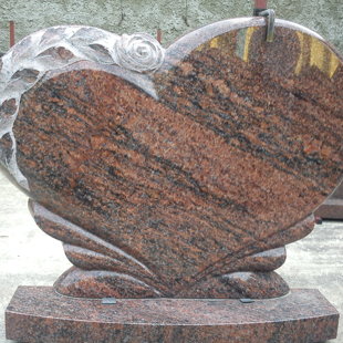 54. Sirds formas kapakmens